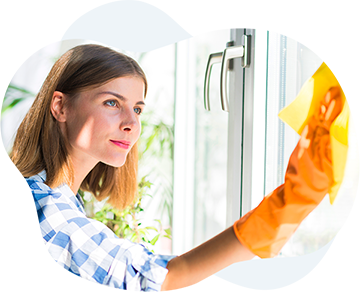 a woman cleaning a window