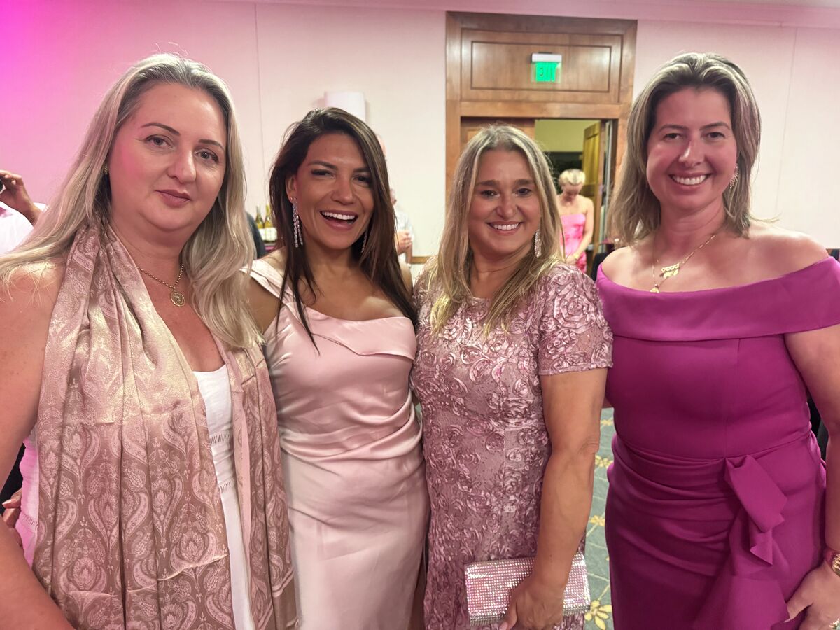 Cris and fellow supporters dressed in pink at a Cleaning for a Reason event